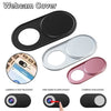 Various designs of a webcam cover or slider for digital privacy, shown in black, silver, and pink.
