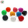 A collection of colorful arcade push button game switches in various colors including orange, pink, purple, green, yellow, bl
