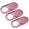 A set of three pink magnetic privacy covers for a webcam.