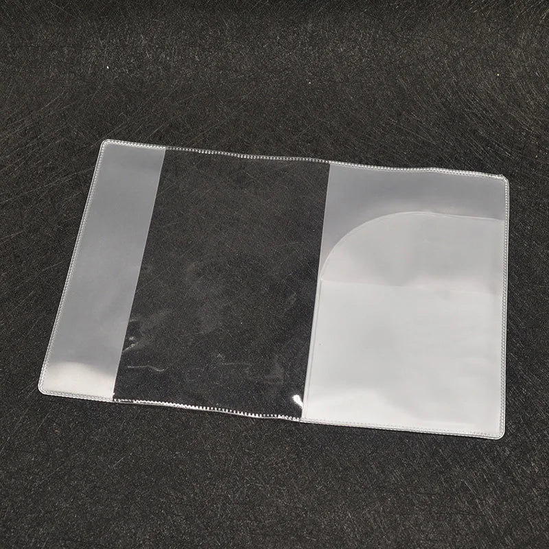 A transparent PVC passport and ID holder wallet with a black stripe on a dark surface.