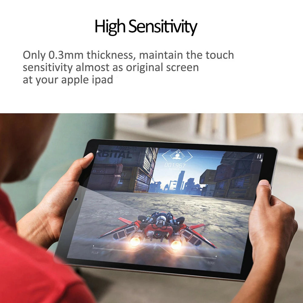 A hand holds an iPad displaying a vibrant scene, demonstrating the high sensitivity of a 0.3mm tempered glass screen protecto