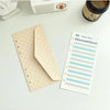 A set of twelve budget planner cards in six colors, including a budget sheet and envelope cards.