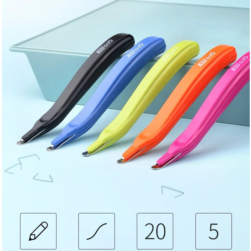 A set of five colored magnetic staple removers with push-button action displayed on a light blue surface.
