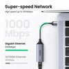 A silver USB to Gigabit Ethernet adapter cable connecting a device to a computer port.