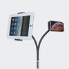 A white tablet stand holding an iPad, with a flexible black arm extending to a smartphone mount.