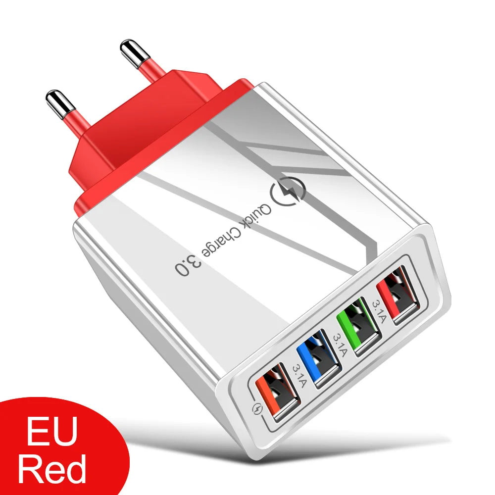 A silver wall adapter with a red plug and four ports for fast charging mobile devices.