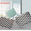 A set of three patterned canvas laptop sleeves featuring a chevron design in black and white on a light gray background.