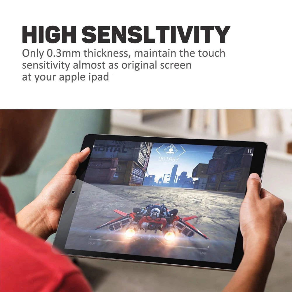 A person is holding an Apple iPad displaying a scene, demonstrating a high sensitivity screen protector.