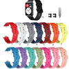 Eine Sammlung von Silikonarmbändern in verschiedenen Farben und Stilen für Huawei Fitness-Tracker.