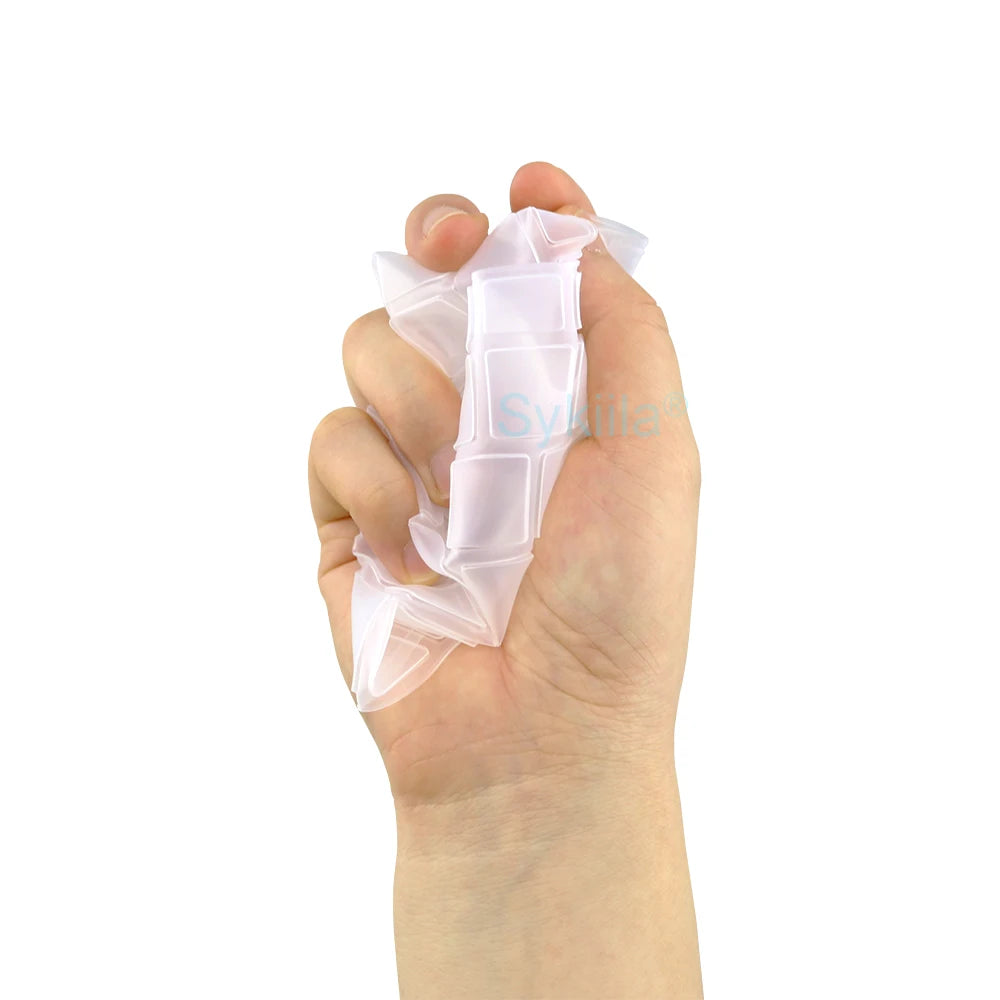 A hand is holding a clear silicone keyboard cover for a Logitech MK345