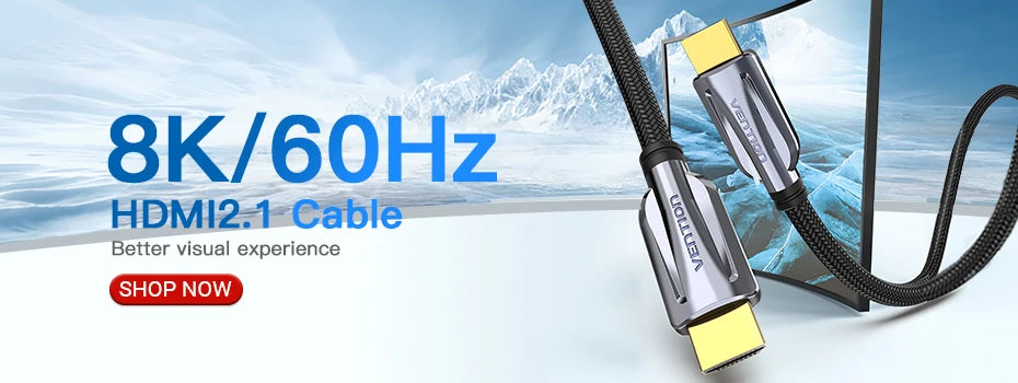 كابل محول من DVI إلى HDMI مزدوج الاتجاه فضي وأصفر أمام خلفية جبل ثلجي.