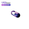A purple and blue starry sky themed privacy webcam cover sticker for laptops.