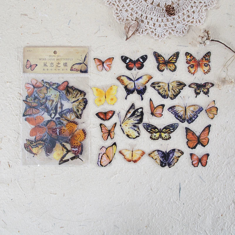 A collection of colorful butterfly wings in a clear plastic packet for scrapbooking and journaling