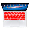 A white silicone keyboard cover for a MacBook, showing the laptop with its lid open.