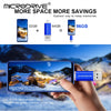 يد تمسك بمحول بطاقة microSD موصول بهاتف يعرض منظرًا ثلجيًا.