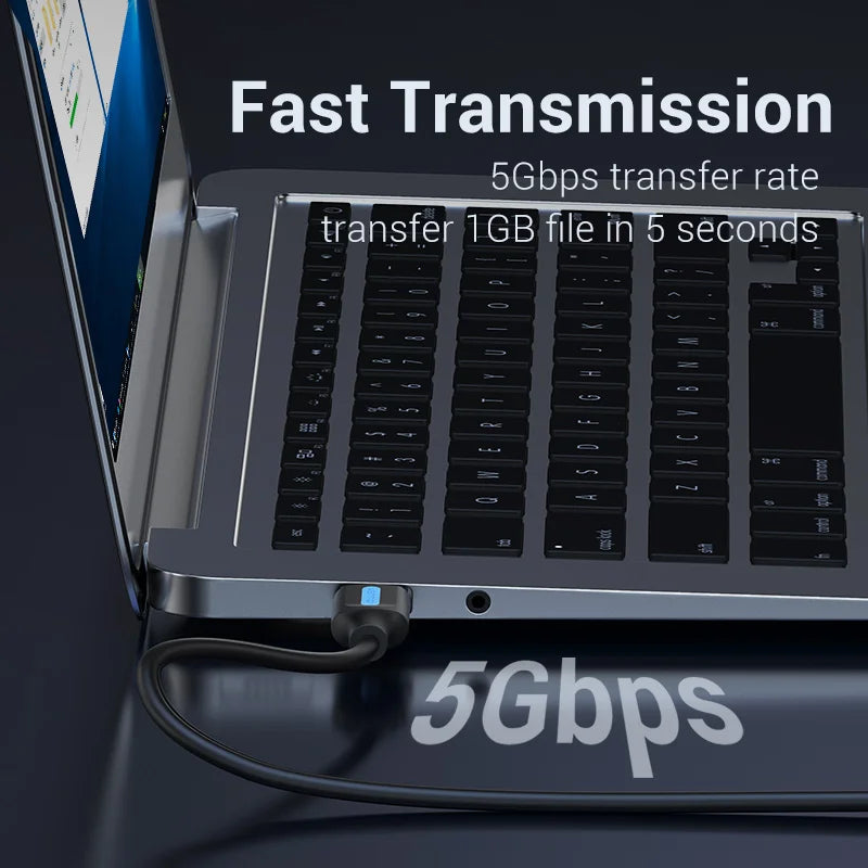 A close-up of a laptop with a USB 3.0 male to male extension cable connected, demonstrating fast data transmission.