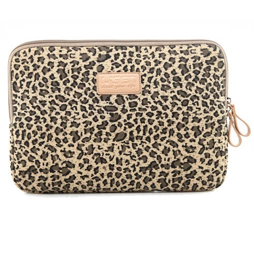 A beige and brown leopard print durable canvas laptop sleeve for a MacBook or PC.