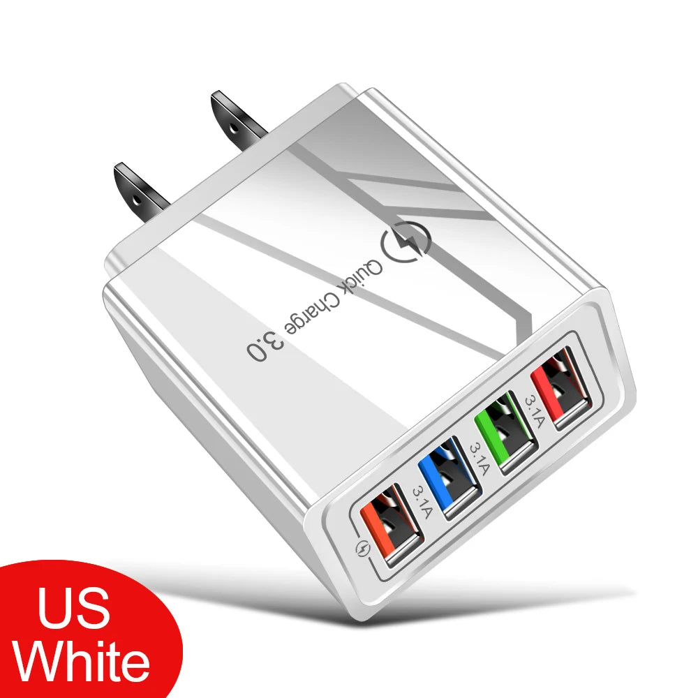 A white 4-port fast charging wall adapter with multiple USB ports and a quick charge indicator.