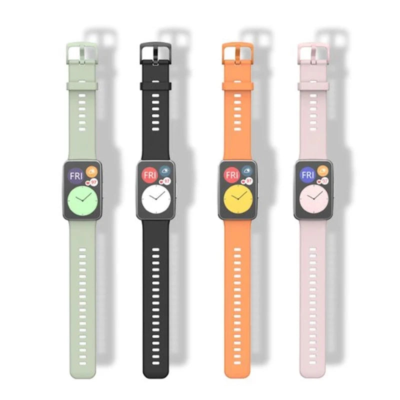 Set Silikonarmbänder in grün, schwarz und pink für Huawei Fitness-Tracker.