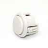 A white arcade push button game switch with a plastic housing and a lever mechanism.