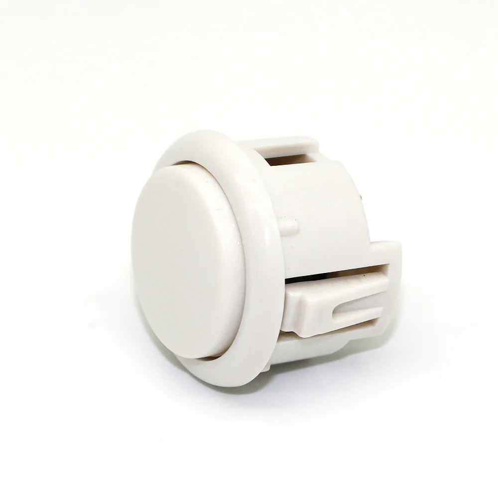 A white arcade push button game switch with a plastic housing and a lever mechanism.