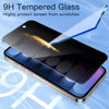 A hand applying a 9H tempered glass screen protector film to a smartphone screen.