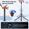 A black auto-pop-up tripod selfie stick is shown with a hand preparing to touch the device for deployment.