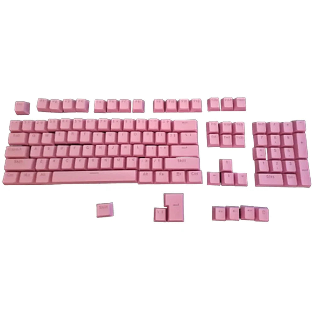 A set of pink mechanical keyboard keycaps, including a full layout and various individual keys.