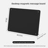 A black desktop magnetic message board with a rectangular shape and mounting holes.