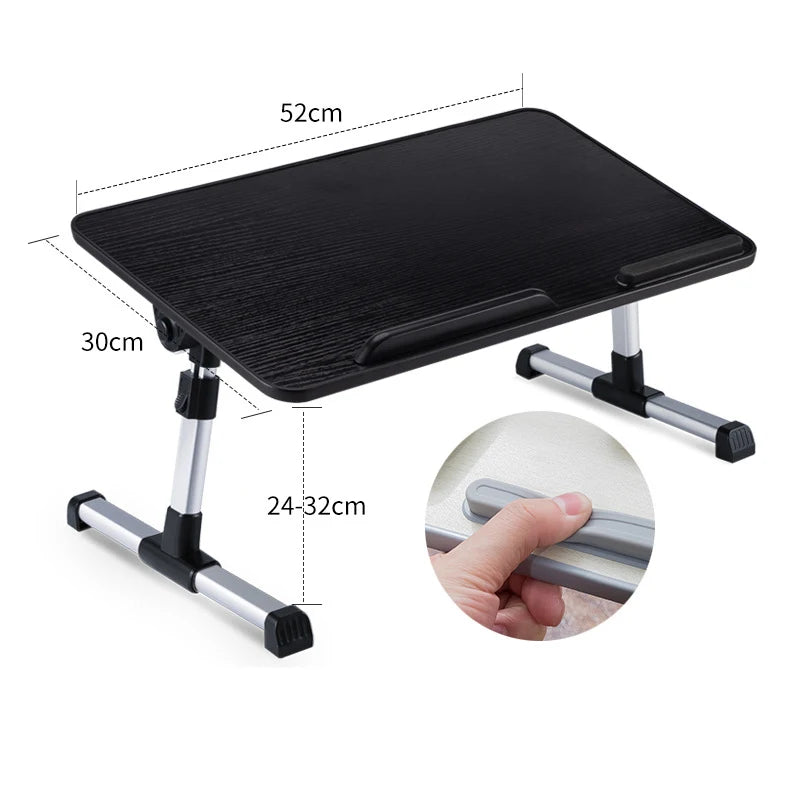 A black portable adjustable laptop desk stand with a flat surface and folding legs.