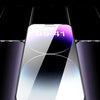 A close-up view of an iPhone screen protector being applied to a smartphone, highlighting its clear glass surface.