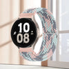 A pink nylon watch strap with a woven texture is shown on a smartwatch, displaying the time 10:08.