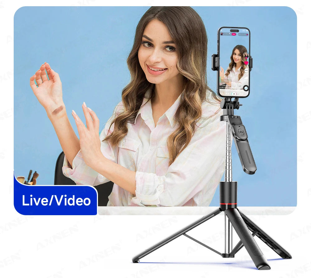 A woman is using an extendable selfie stick tripod for live video streaming.
