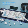 A white TS68 RGB gaming keyboard is displayed on a blue surface with a smartphone and headphones nearby.