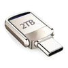 Silver flash drive with 2TB capacity and a USB Type-C connector.