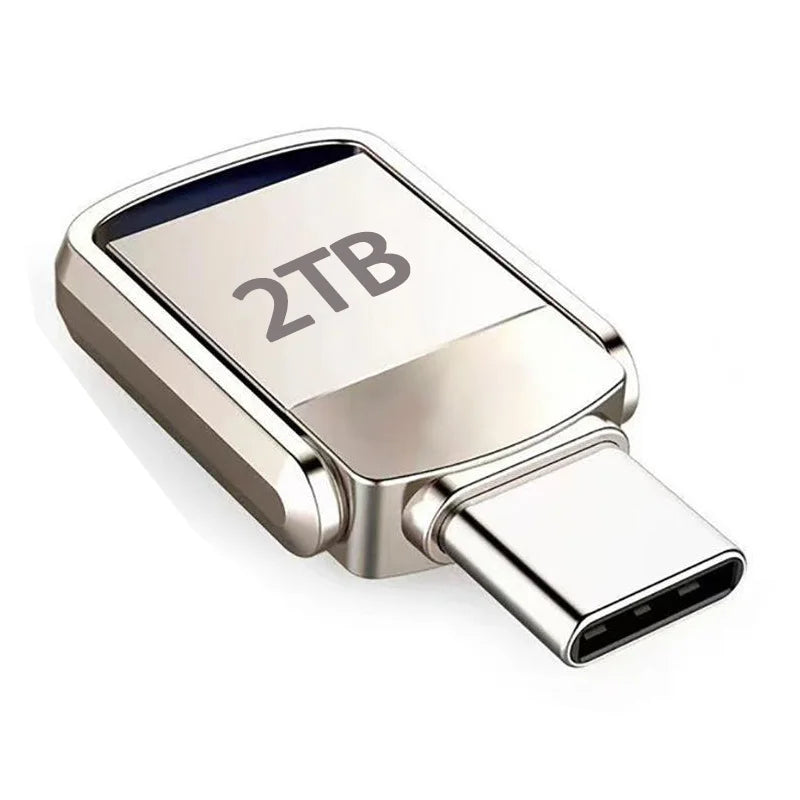 Silver flash drive with 2TB capacity and a USB Type-C connector.