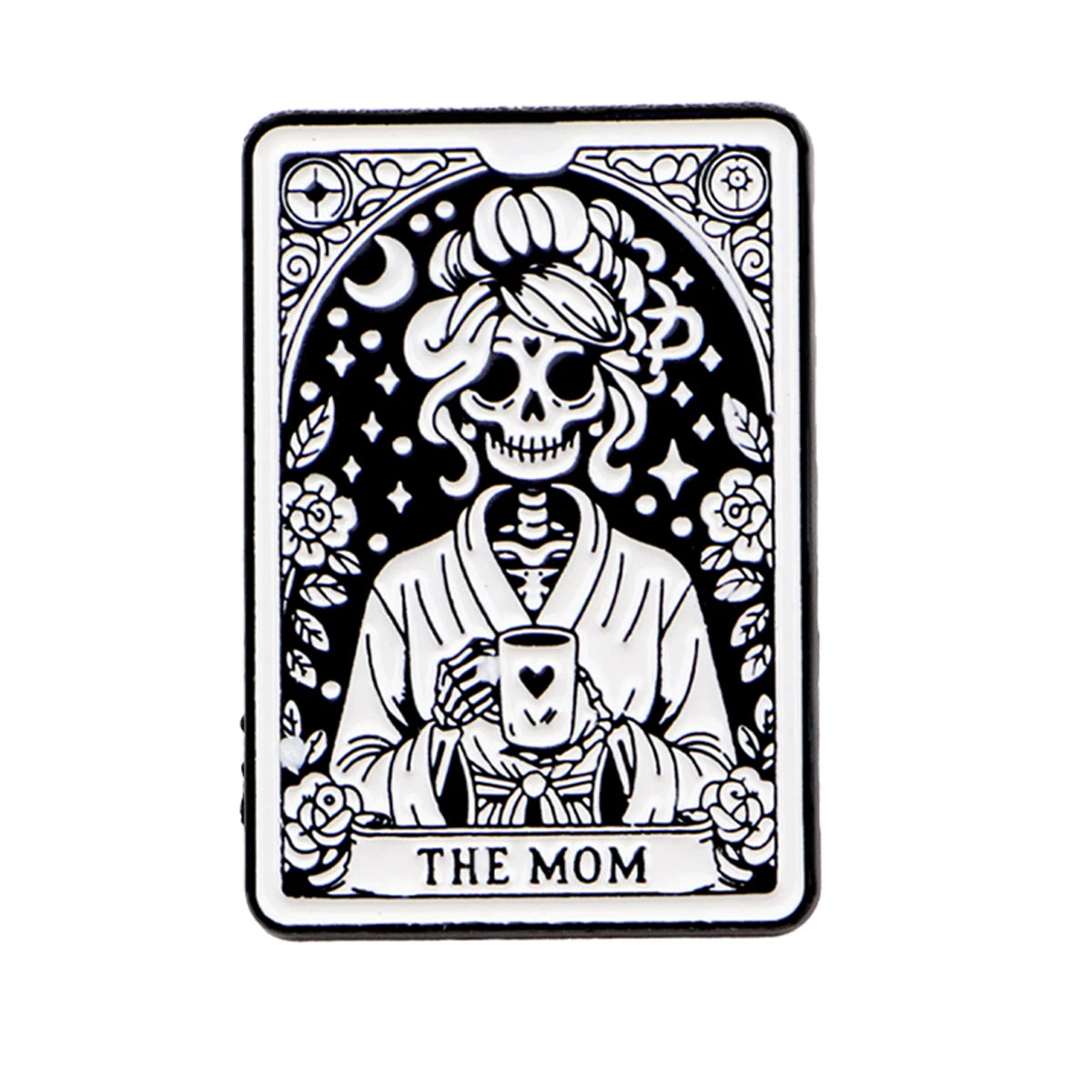 Black and white enamel pin featuring a skull design with roses and the text THE MOM