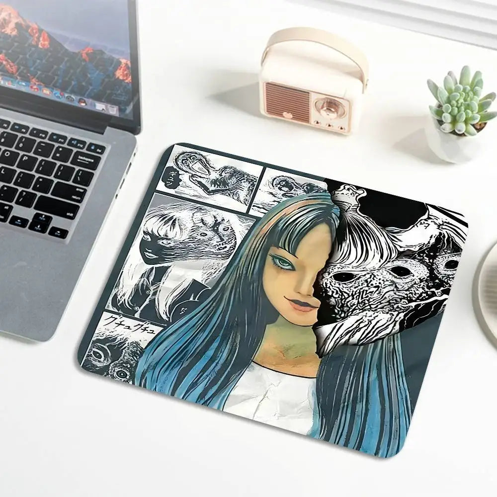 A dark illustration of a woman with long blue hair and a fierce animal face covers the surface of a mouse pad.