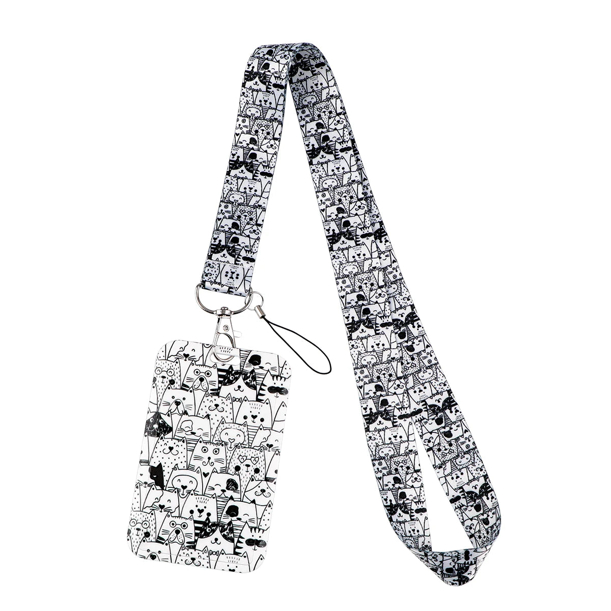 A black and white patterned cartoon cat card holder lanyard with a neck strap.