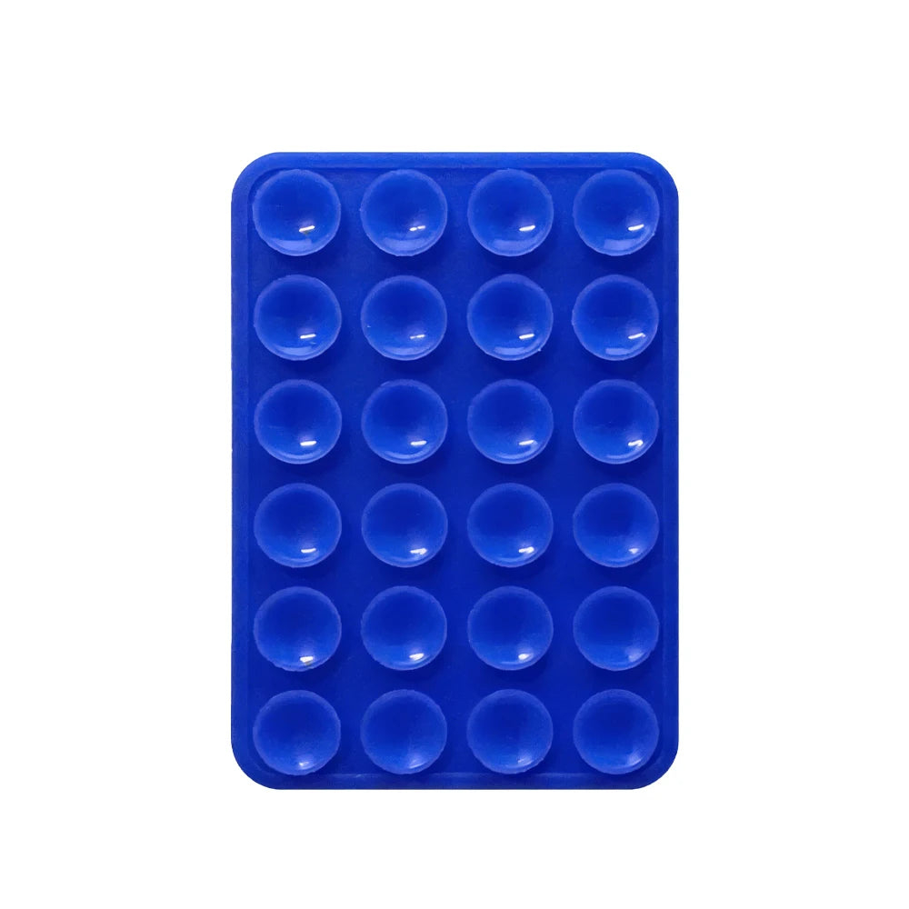 A blue silicone suction cup phone mount with multiple circular holes for mounting devices.
