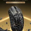 A black R5 Ultra gaming mouse with an intricate carbon fiber design is shown resting on a dark, rocky surface.