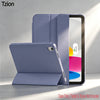 A purple trifold smart cover for an iPad is shown next to the tablet and stylus.