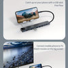 A multi-port USB-C docking hub is shown connecting a mobile phone to a TV for media playback.