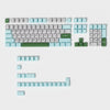 A set of dark blue PBT keycaps with cherry profile for mechanical keyboards, arranged in various layouts.