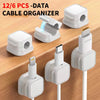 A set of 12/6 pcs data cable organizers and magnetic clips for managing charging cables.