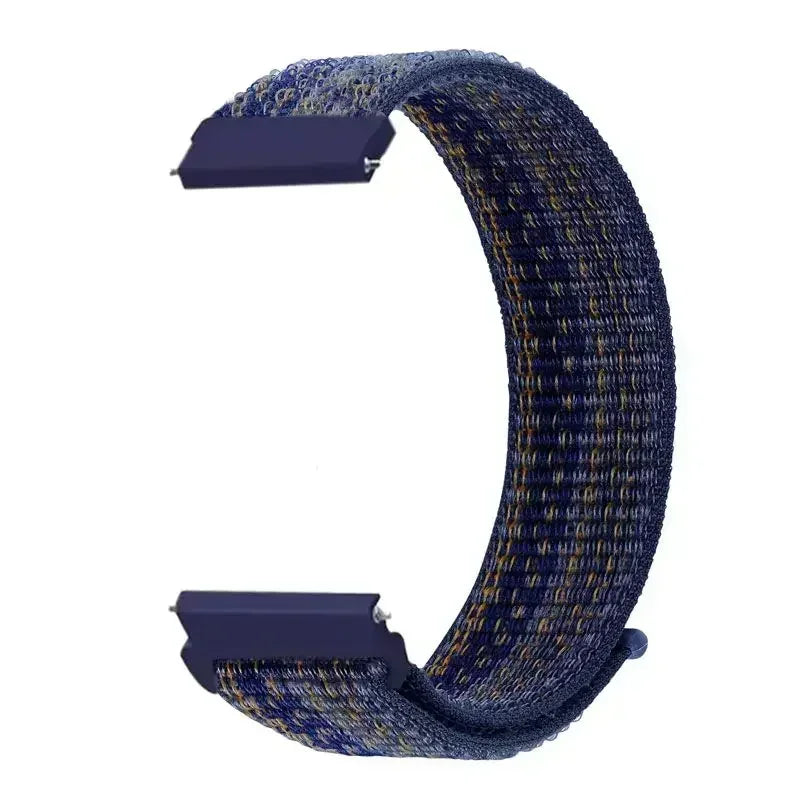 A close-up view of a dark blue nylon loop watch strap with a textured pattern.