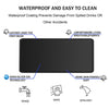Black waterproof desk mat featuring leather lining, nano-silver ion technology, and breathable fabrics for easy cleaning.
