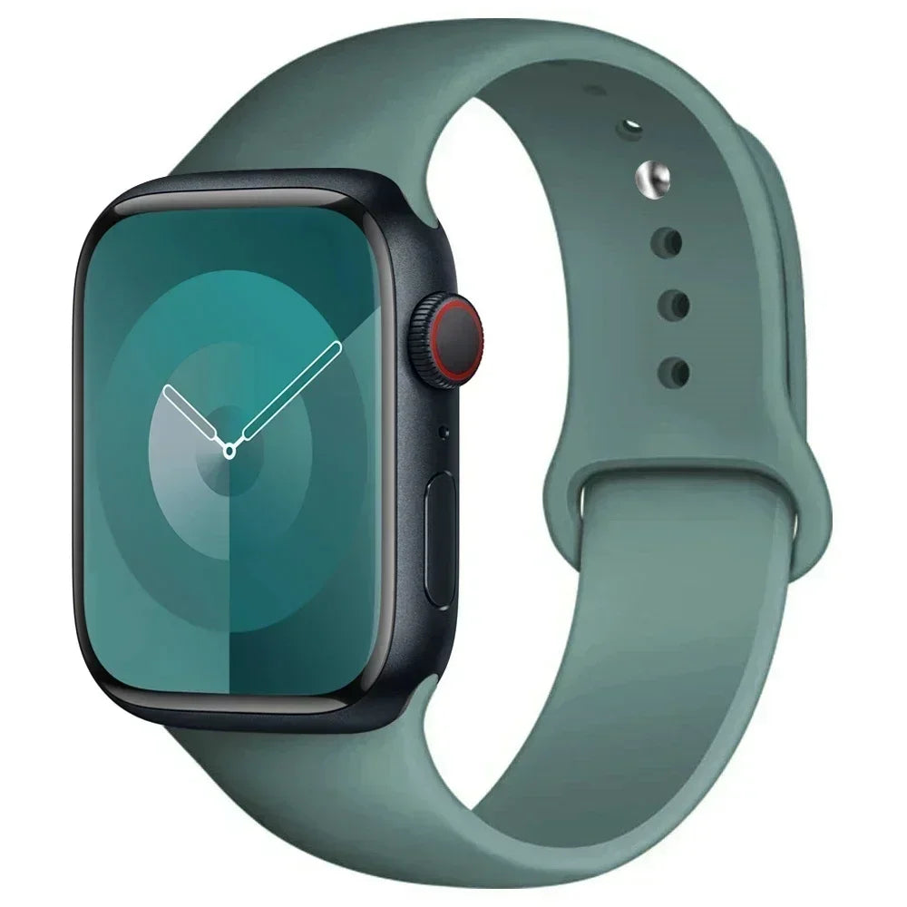 A silicone sport band in a muted green color is shown around an Apple Watch.