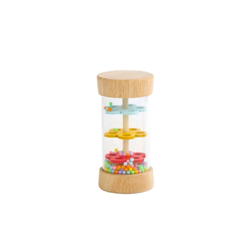 A wooden rain sound tube musical instrument with colorful beads inside.
