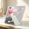 A clear silicone case with a floral design protects an iPad or tablet.